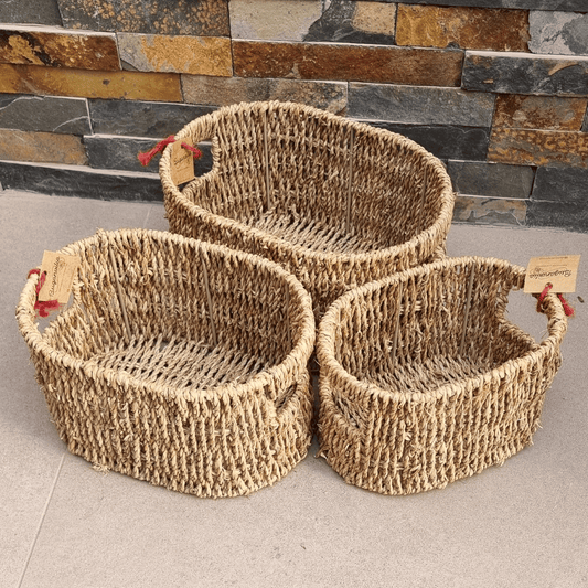 Set de tres canastos ovalados Hue de fibra natural de seagrass, diferentes tamaños.